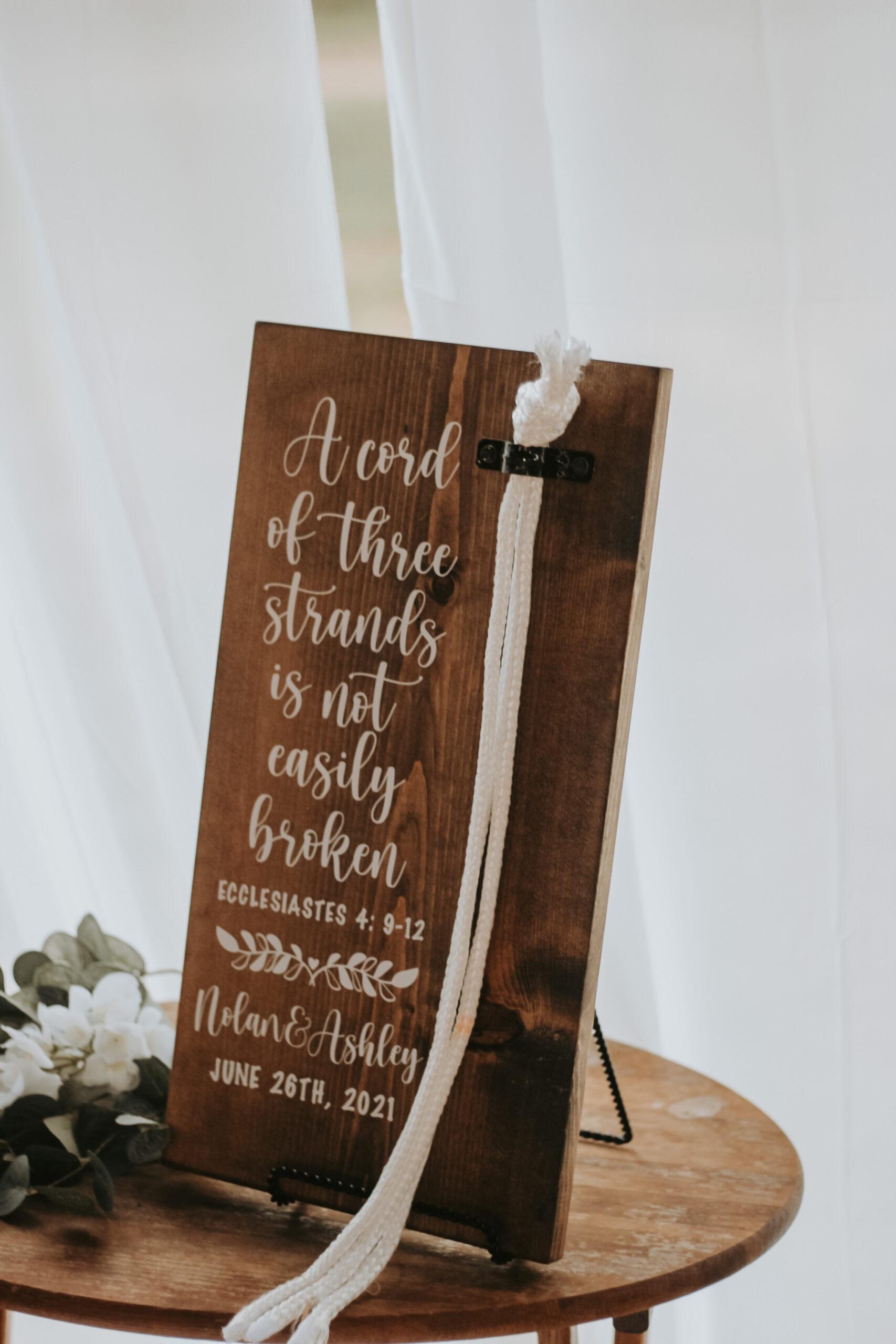 plaque at the alter with the ties that bind