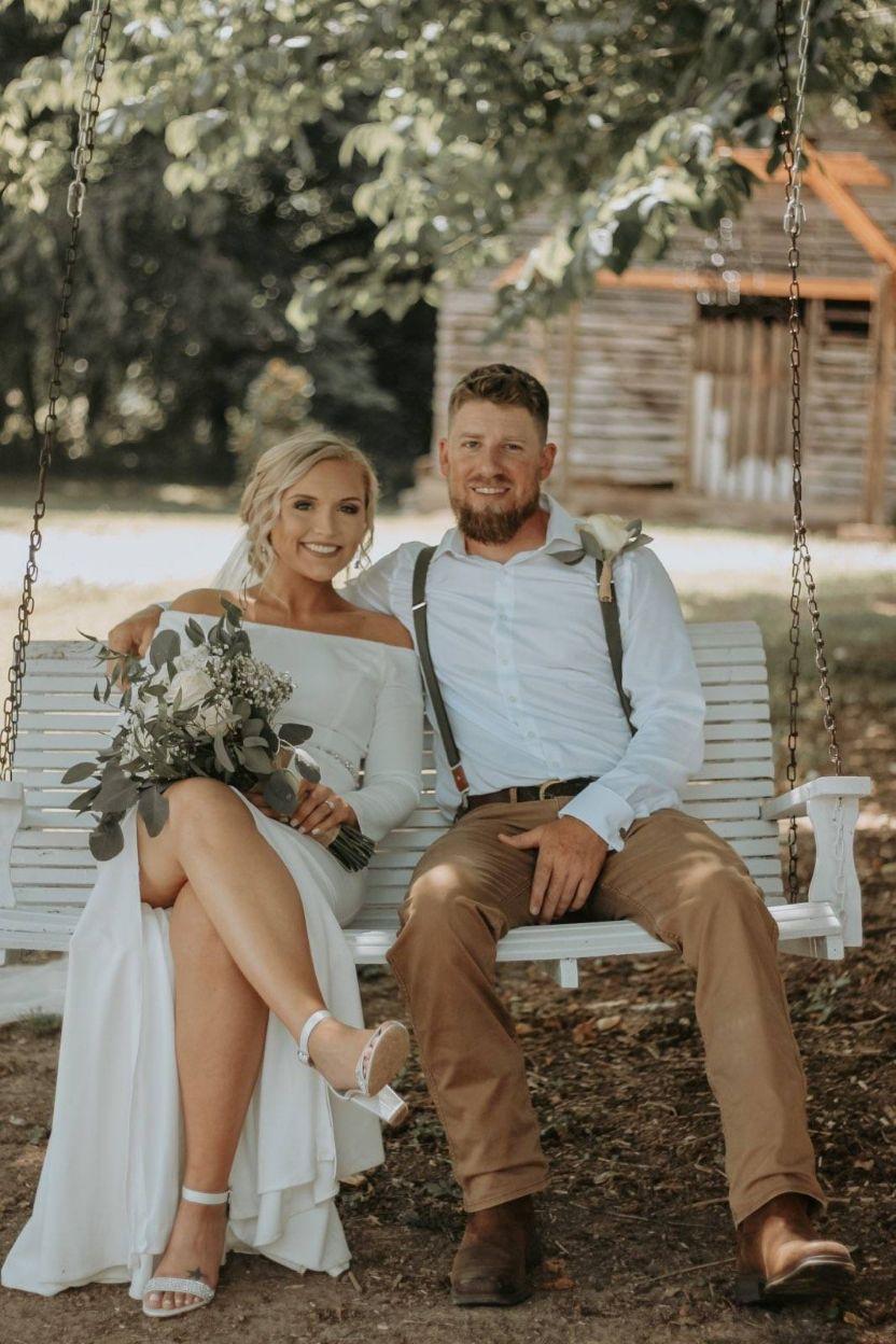 Ashely and Nolen Dale on the porch swing at Hayes House