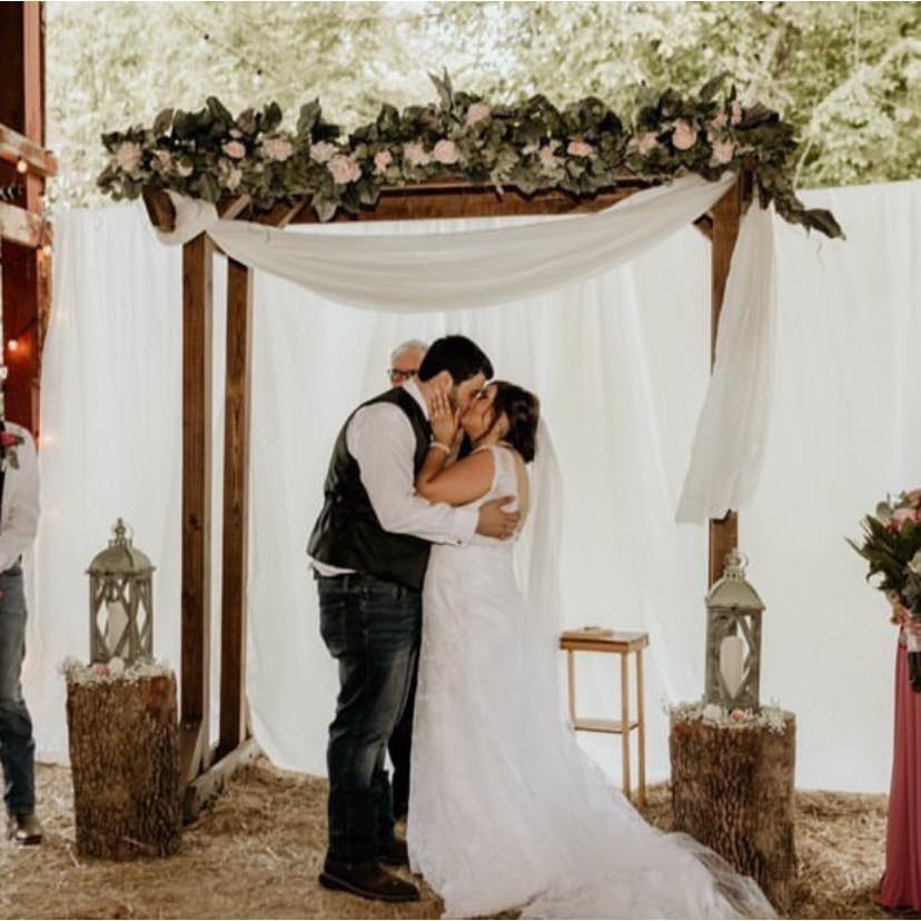 Jessica and Caydan Ferrell at the alter