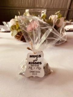 The Hugs and Kisses gift to guests from the Bride and Groom were a perfect chocolate accent to the wedding cake