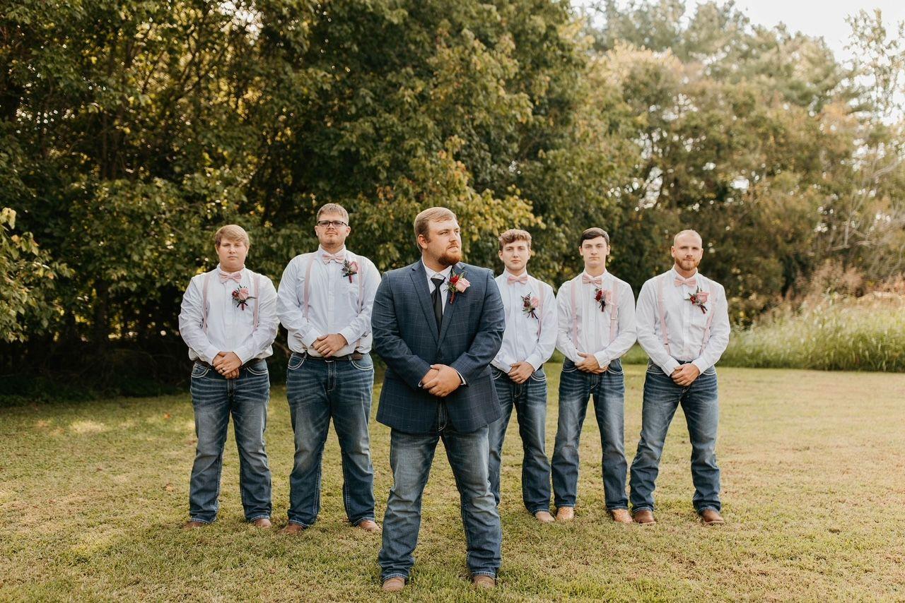 Groom and the groomsmen on the grounds of Hayes House