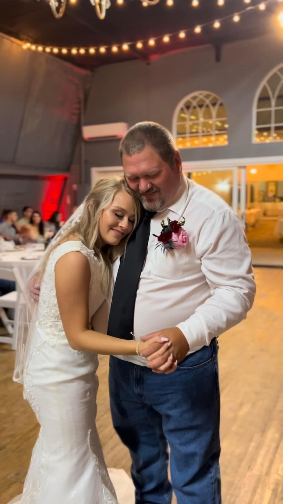 Caitlin and her father enjoy a Father-Daughter dance