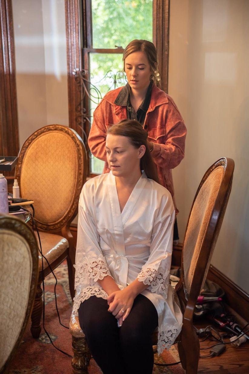 The bride in hair and makeup