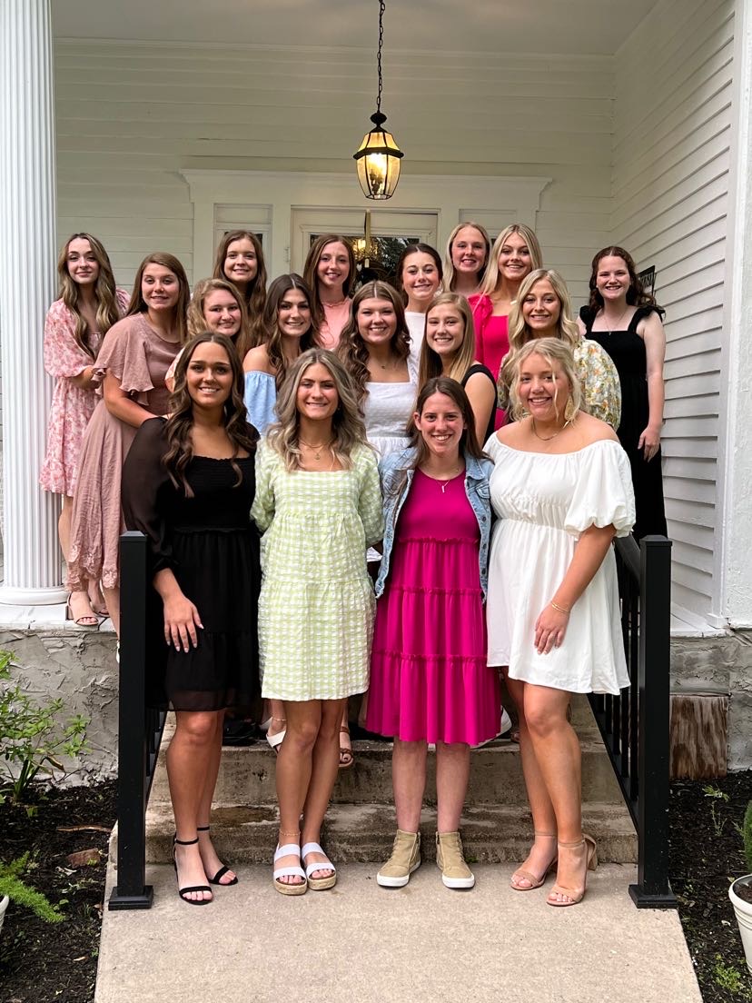 The 2022/23 Lady Dawgs Basketball Team Celina High School gathered on the veranda and steps of the Historic Hayes House<br />
