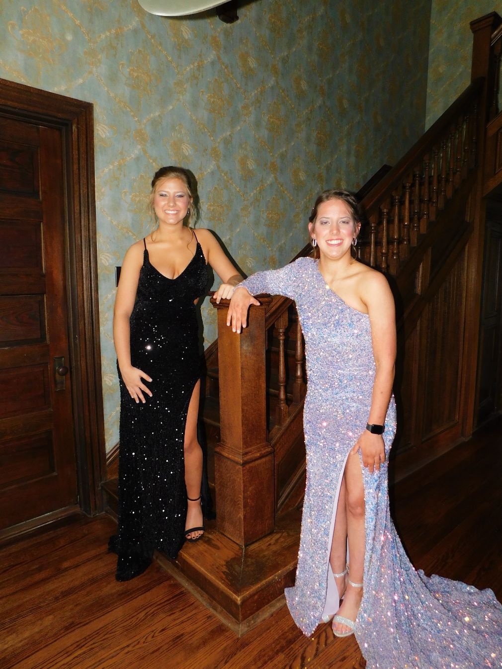 Two ladies ready for Prom on the staircase in the foyer of the Historic Hayes House<br />
